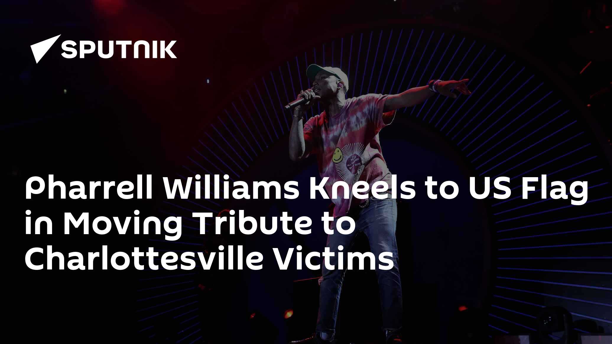 Pharrell Williams Kneels to US Flag in Moving Tribute to