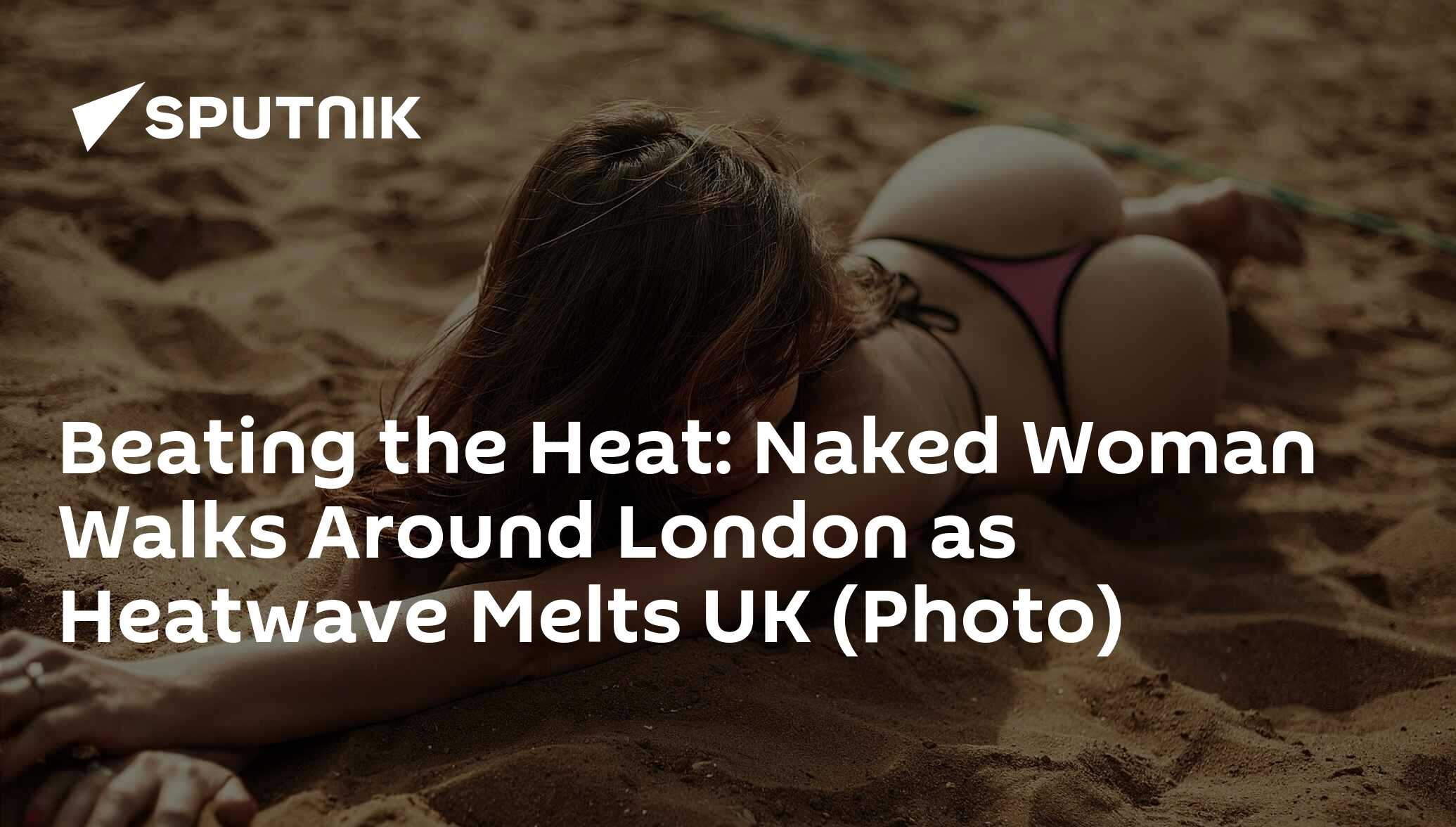 Beating the Heat: Naked Woman Walks Around London as Heatwave Melts UK  (Photo)