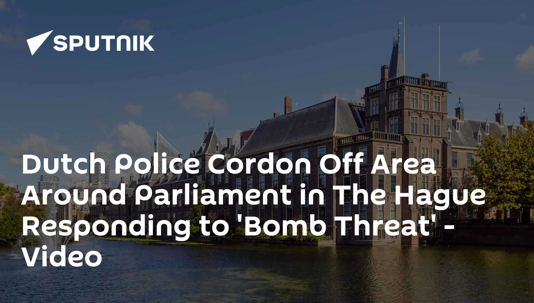 Dutch police cordon off area around parliament in the hague responding to 'bomb threat' - video