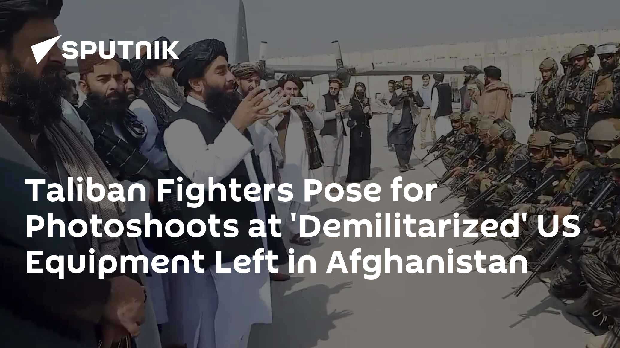 Taliban Fighters Pose for Photoshoots at 'Demilitarized' US Equipment ...