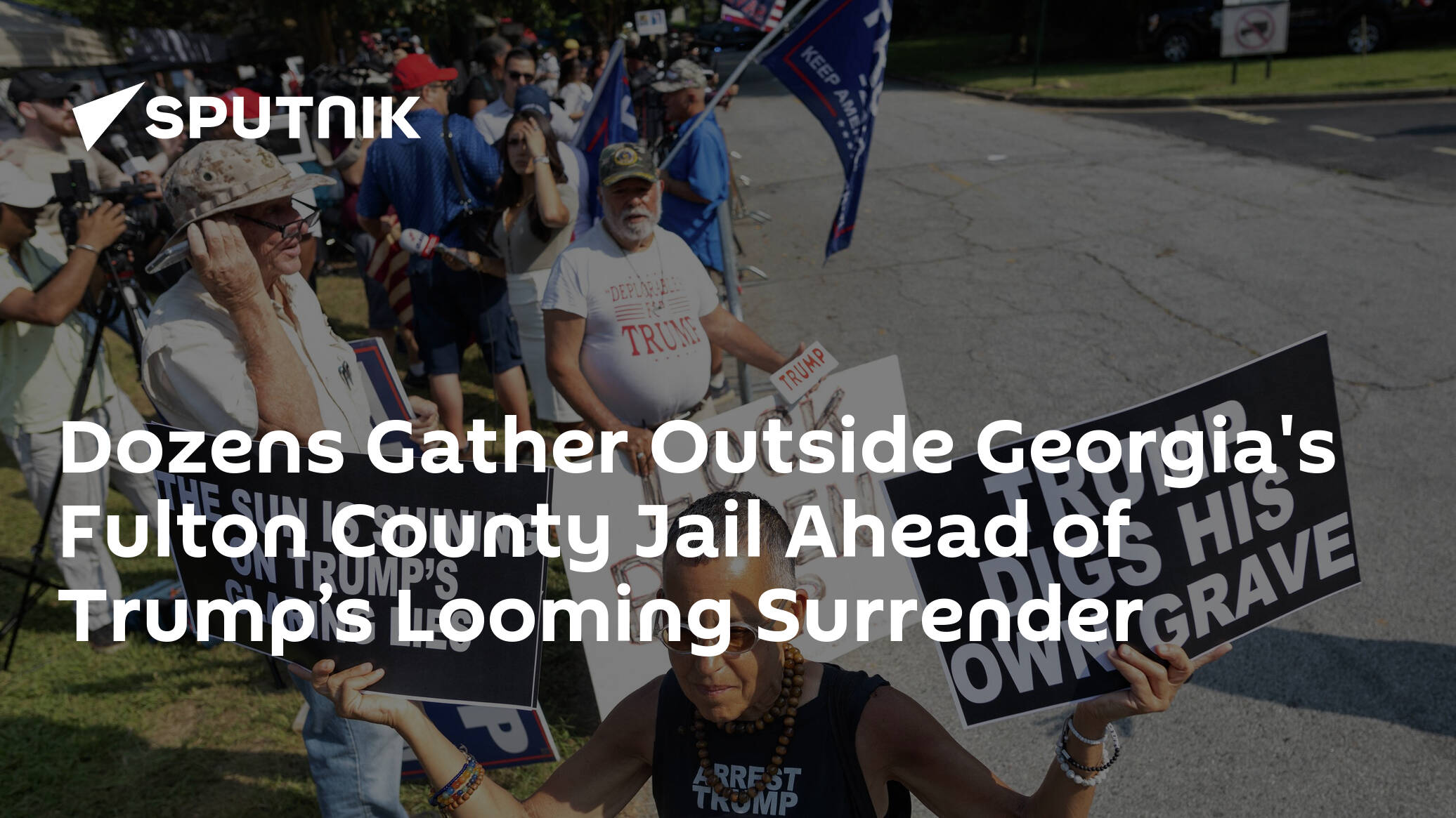 Dozens Gather Outside Georgia's Fulton County Jail Ahead of Trump’s Looming Surrender