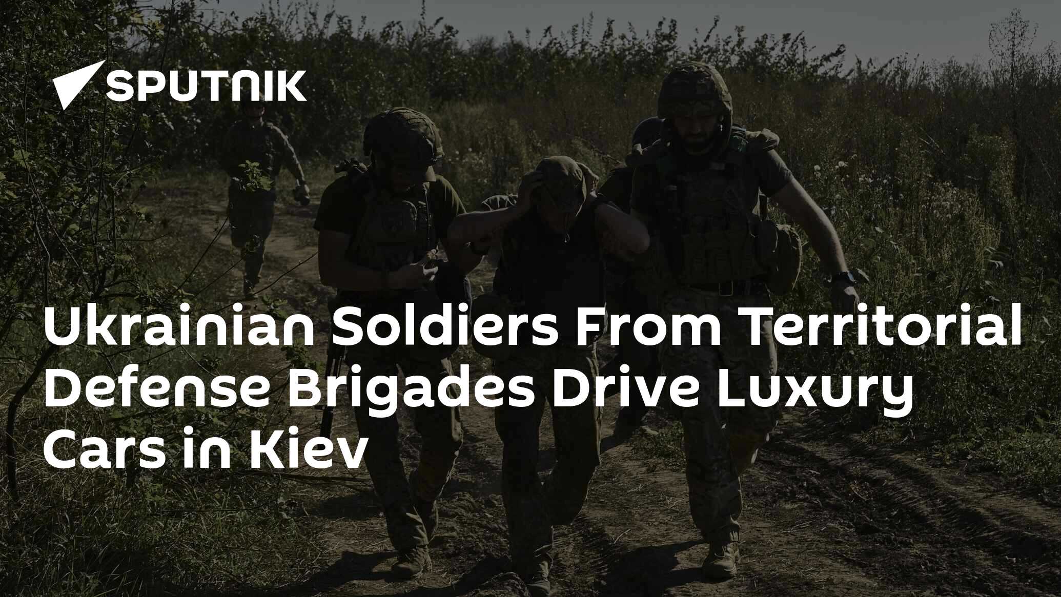 Ukrainian Soldiers From Territorial Defense Brigades Drive Luxury Cars in Kiev
