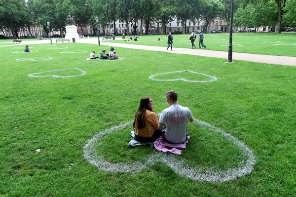 Hearts painted by a team of artists from Upfest are seen in the grass in Queen Square, following the coronavirus (COVID-19) outbreak, in Bristol, Britain 8 July 2020.  - Sputnik International