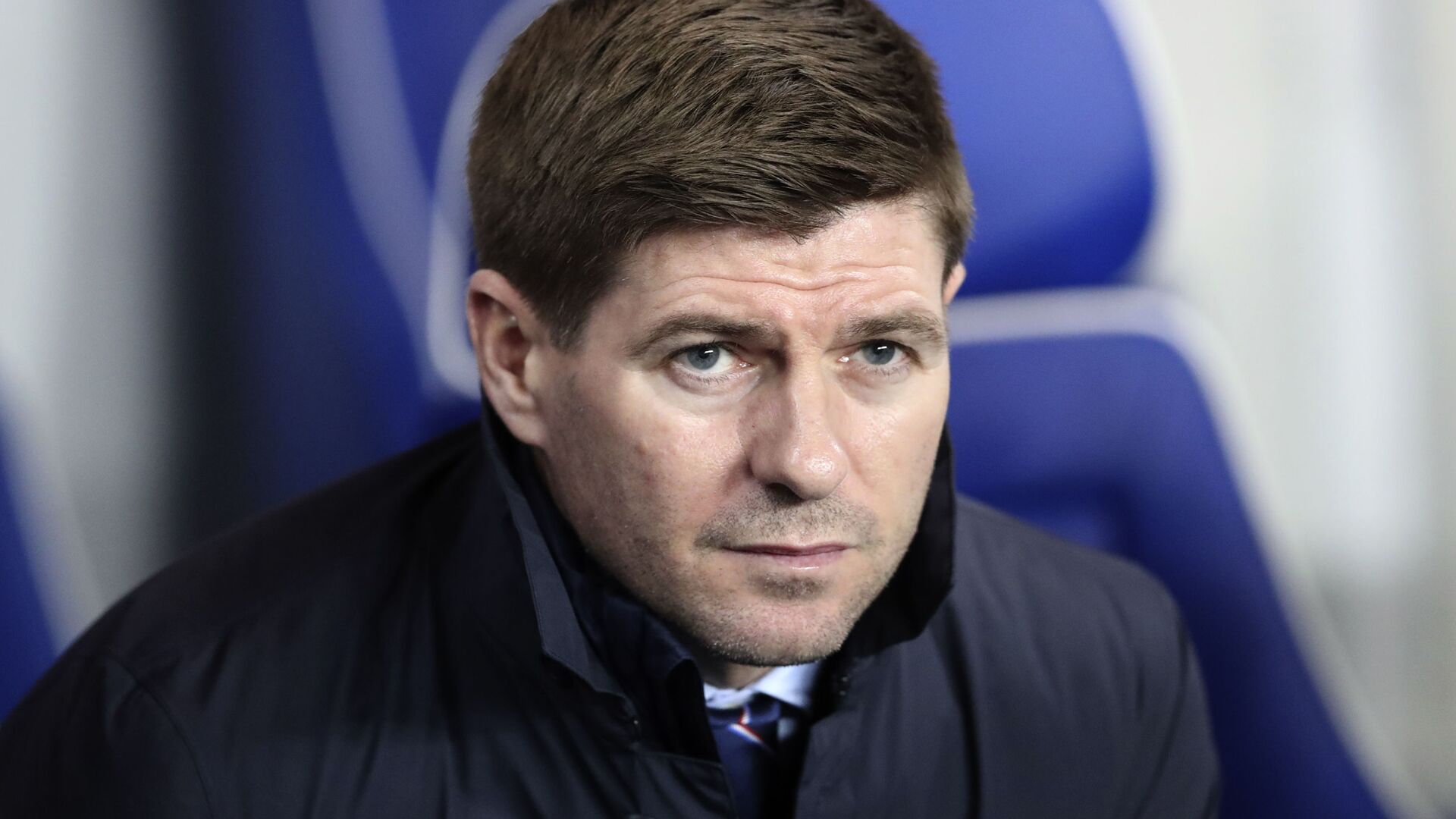 Rangers' manager Steven Gerrard sits on the bench during the Europa League round of 16 first leg soccer match between Rangers and Bayer Leverkusen at the Ibrox stadium in Glasgow, Scotland, Thursday, March 12, 2020 - Sputnik International, 1920, 25.01.2022