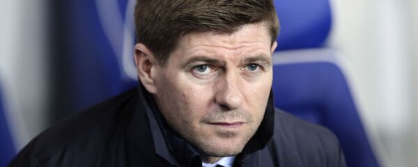 Rangers' manager Steven Gerrard sits on the bench during the Europa League round of 16 first leg soccer match between Rangers and Bayer Leverkusen at the Ibrox stadium in Glasgow, Scotland, Thursday, March 12, 2020 Rangers' manager Steven Gerrard sits on the bench during the Europa League round of 16 first leg soccer match between Rangers and Bayer Leverkusen at the Ibrox stadium in Glasgow, Scotland, Thursday, March 12, 2020 - Sputnik International