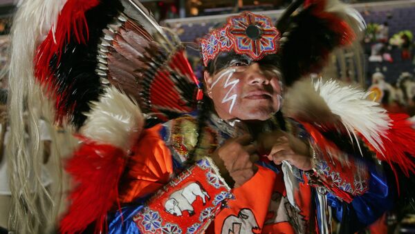 Native American Dwight White Buffalo, a Cheyenne from Watonga, Oklahoma, prepares for the opening of the National Pow Wow 12 August 2005 at the MCI Center in Washington, DC - Sputnik International
