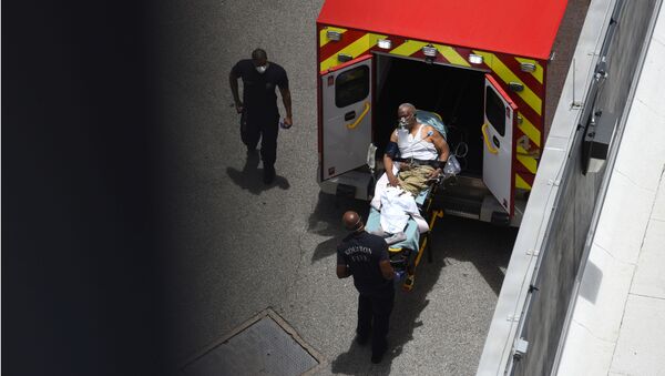 A man arrives at Houston Methodist Hospital emergency room on a stretcher amid a coronavirus disease (COVID-19) outbreak in Houston, Texas, U.S., June 28, 2020 - Sputnik International