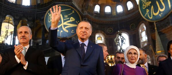 Turkish President Tayyip Erdogan accompanied by his wife Emine Erdogan attends the opening ceremony of the Yeditepe Biennial at the Hagia Sophia or Ayasofya Museum in Istanbul, Turkey, 31 March 2018. Turkish President Tayyip Erdogan accompanied by his wife Emine Erdogan attends the opening ceremony of the Yeditepe Biennial at the Hagia Sophia or Ayasofya Museum in Istanbul, Turkey, 31 March 2018. - Sputnik International