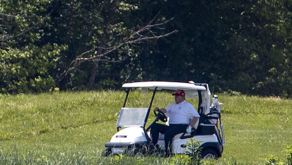 U.S. President Donald Trump golfs at Trump National Golf Club on June 21, 2020 in Potomac Falls, Virginia. Trump spent Father's Day on the golf course a day after holding his first public political rally since the beginning of the coronavirus pandemic. - Sputnik International