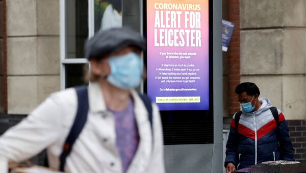 An NHS alert message is seen on a street, following a local lockdown imposed amid the coronavirus disease (COVID-19) outbreak, in Leicester, Britain, July 1, 2020 - Sputnik International