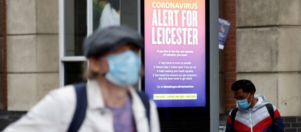 An NHS alert message is seen on a street, following a local lockdown imposed amid the coronavirus disease (COVID-19) outbreak, in Leicester, Britain, July 1, 2020 - Sputnik International