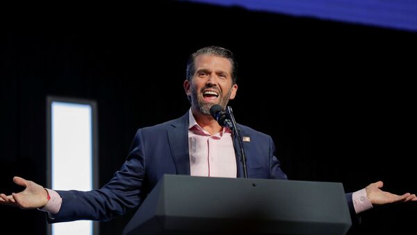 Donald Trump Jr. speaks to young people waiting to hear his father, U.S. President Donald Trump, deliver an Address to Young Americans at the Dream City Church in Phoenix, Arizona, U.S., June 23, 2020 - Sputnik International