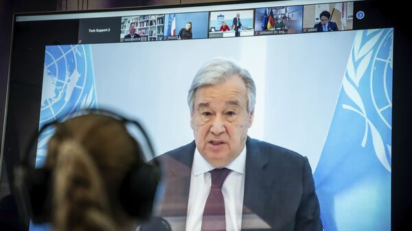 Antonio Guterres, UN Secretary-General displayed on a screen at the  Environment Ministry as he delivers his speech at the Petersberg Climate Dialogue, in Berlin, Germany, Tuesday, April 28, 2020. - Sputnik International