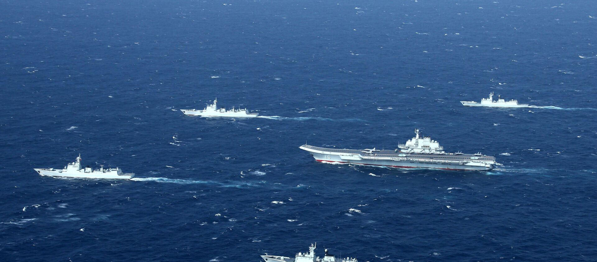 This aerial file photo taken on January 2, 2017 shows a Chinese Navy formation, including the aircraft carrier Liaoning (C), during military drills in the South China Sea. - Sputnik International, 1920, 14.07.2020