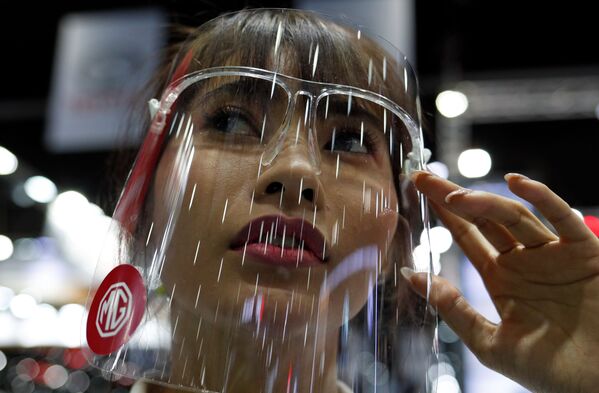A model is pictured during the media day of the 41st Bangkok International Motor Show after the Thai government eased measures to prevent the spread of the coronavirus disease (COVID-19) in Bangkok, Thailand July 14, 2020.  - Sputnik International