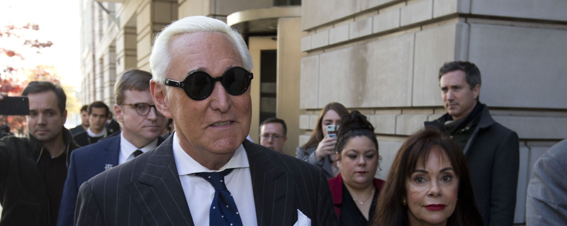 In this Nov. 15, 2019, file photo, Roger Stone, left, with his wife Nydia Stone, leaves federal court in Washington, Friday, Nov. 15, 2019 - Sputnik International, 1920, 03.11.2021