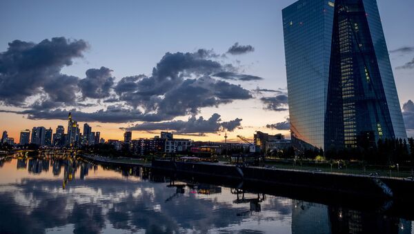 Clouds are seen over the buildings of the banking district and the European Central Bank, right, after sunset in Frankfurt, Germany, Thursday, June 18, 2020 - Sputnik International