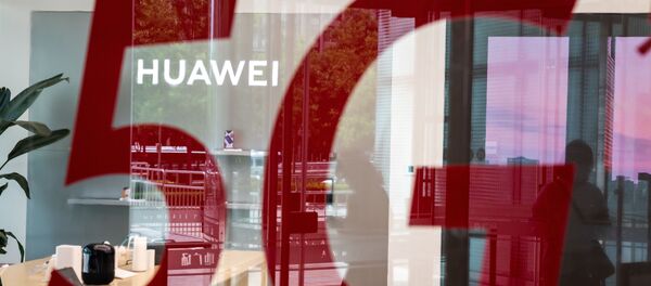 (FILES) This file photo taken on May 25, 2020, shop for Chinese telecom giant Huawei features a red sticker reading 5G in Beijing on May 25, 2020 (FILES) This file photo taken on May 25, 2020, shop for Chinese telecom giant Huawei features a red sticker reading 5G in Beijing on May 25, 2020 - Sputnik International