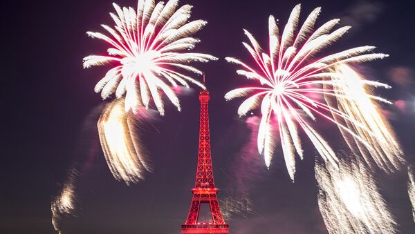 Fireworks illuminate the Eiffel Tower in Paris during Bastille Day celebrations late Sunday, July 14, 2019. Bastille Day marks the July 14, 1789, storming of the Bastille prison by angry Paris crowds that helped spark the French Revolution. - Sputnik International