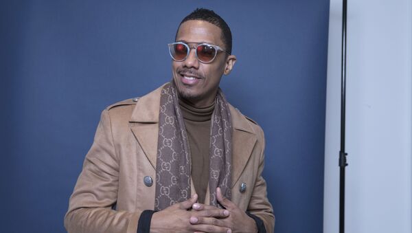 In this Dec. 10, 2018 photo, Nick Cannon poses for a portrait in New York to promote promoting his new show, The Masked Singer - Sputnik International