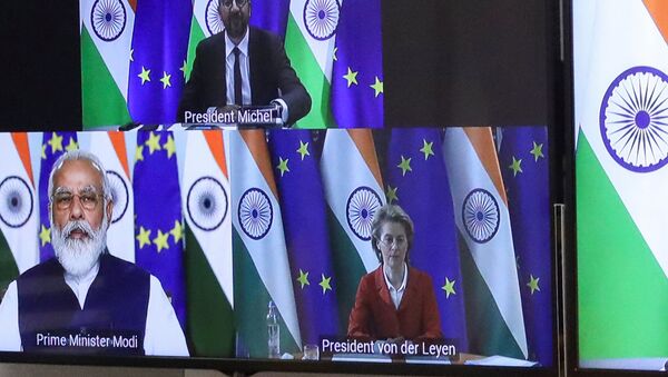 European Council President Charles Michel, Ursula von der Leyen and Indian Prime Minister Narendra Modi are seen on the monitor as they take part in a virtual summit, in Brussels, Belgium, July 15, 2020. REUTERS/Yves Herman/Pool - Sputnik International