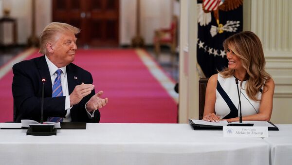 US President Donald Trump applauds first lady Melania Trump during an event on reopening schools amid the coronavirus disease (COVID-19) pandemic in the East Room of the White House, 7 July 2020 - Sputnik International