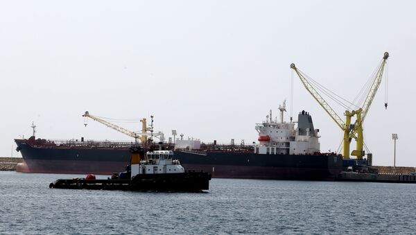 A cargo ship is docked at Shahid Beheshti Port in the southeastern Iranian coastal city of Chabahar, on the Gulf of Oman - Sputnik International