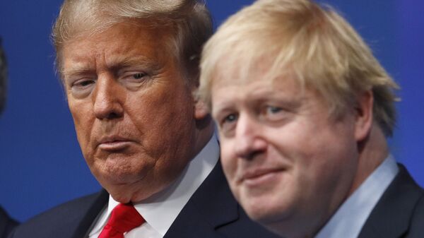 British Prime Minister Boris Johnson, right, and U.S. President Donald Trump pose during a group photo during a NATO leaders meeting at The Grove hotel and resort in Watford, Hertfordshire, England, Wednesday, Dec. 4, 2019.  - Sputnik International