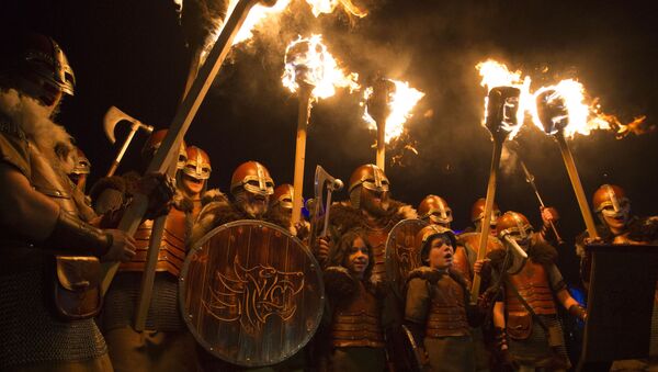 People dressed as Vikings get ready to lead a torchlight procession in Edinburgh, which marks the opening of Edinburgh's New Year celebrations, Saturday Dec. 30, 2017 - Sputnik International