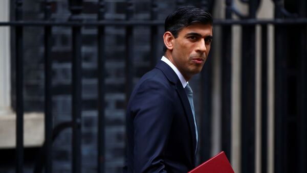 Britain's Chancellor of the Exchequer Rishi Sunak reacts as he leaves Downing Street, in London, Britain July 8, 2020. - Sputnik International