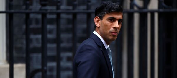 Britain's Chancellor of the Exchequer Rishi Sunak reacts as he leaves Downing Street, in London, Britain July 8, 2020. - Sputnik International
