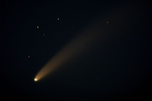 The comet Neowise is seen from near Effingham, Kan., Monday, July 13, 2020 - Sputnik International