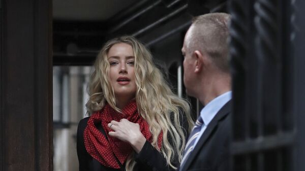 Actress Amber Heard, center, arrives at the High Court in London, Thursday, July 16, 2020 - Sputnik International