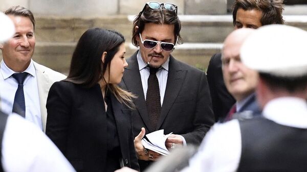 Actor Johnny Depp leaves the High Court in London, Wednesday July 15, 2020 - Sputnik International