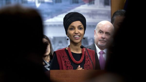 Congressional Progressive Caucus members Rep. Ilhan Omar, D-Minn., accompanied by Rep. Mark Pocan, D-Wis., and other members of the Caucus, speaks during a news conference on last week's targeted killing of Iran's senior military commander Gen. Qassem Soleimani on Capitol Hill, in Washington, Wednesday, Jan. 8, 2020. - Sputnik International