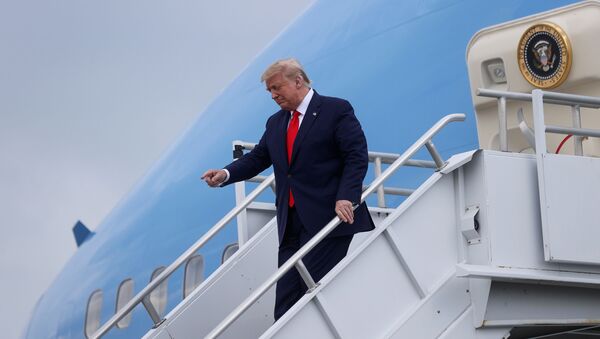 U.S. President Donald Trump deplanes from Air Force One as he arrives at Hartsfield-Jackson Atlanta International Airport in Atlanta, Georgia, U.S.,  July 15, 2020. - Sputnik International