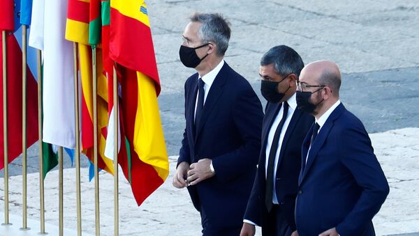 NATO Secretary-General Jens Stoltenberg and European Council President Charles Michel arrive to attend a state tribute in memory of Spain's coronavirus disease (COVID-19) victims, at the Royal Palace in Madrid, Spain July 16, 2020 - Sputnik International