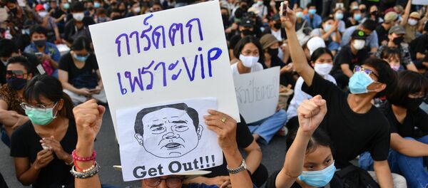 A protester holds a sign depicting Thai Prime Minister Prayuth Chan-Ocha during a protest demanding the resignation of the government, defying the coronavirus disease (COVID-19) restrictions on large gatherings in one of the largest demonstrations since a 2014 army coup in Bangkok, Thailand July 18, 2020. A protester holds a sign depicting Thai Prime Minister Prayuth Chan-Ocha during a protest demanding the resignation of the government, defying the coronavirus disease (COVID-19) restrictions on large gatherings in one of the largest demonstrations since a 2014 army coup in Bangkok, Thailand July 18, 2020. - Sputnik International