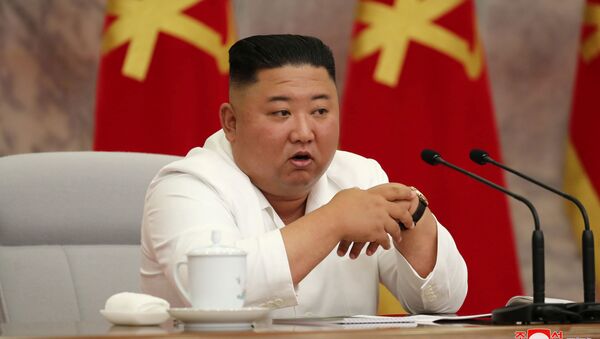 North Korean leader Kim Jong Un guides the 14th enlarged meeting of Political Bureau of 7th Central Committee of WPK in this undated photo released on July 2, 2020 - Sputnik International