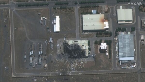 A handout satellite image shows a closeup view of a building damaged by fire at the Natanz nuclear facility in Iran - Sputnik International