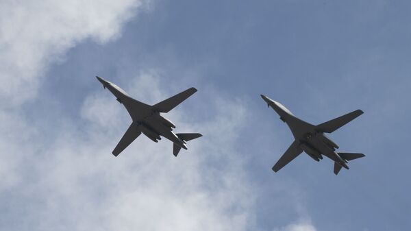 Two B-1B Lancers, assigned to the 28th Bomb Wing, Ellsworth Air Force Base, S.D., conduct a flyover before landing at Andersen AFB, Guam, July 17, 2020. The Bomber Task Force is deployed to Andersen AFB in support of Pacific Air Forces’ training efforts with allies, partners and joint forces. (U.S. Air Force Photo by Airman 1st Class Christina Bennett) - Sputnik International