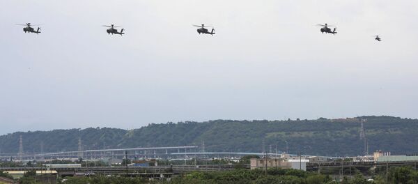 AH-64 Apache helicopters fly to location during the live-fire, anti-landing Han Kuang military exercise, which simulates an enemy invasion, in Taichung, Taiwan July 16, 2020. AH-64 Apache helicopters fly to location during the live-fire, anti-landing Han Kuang military exercise, which simulates an enemy invasion, in Taichung, Taiwan July 16, 2020. - Sputnik International