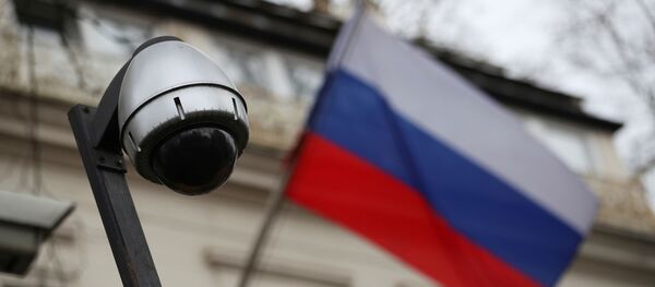 A security camera is seen, and a flag flies outside the consular section of Russia's embassy in London, Britain, March 15, 2018. A security camera is seen, and a flag flies outside the consular section of Russia's embassy in London, Britain, March 15, 2018. - Sputnik International