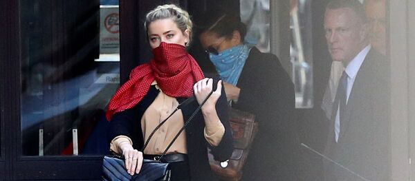 Amber Heard arrives at the High Court in London on 22 July Amber Heard arrives at the High Court in London on 22 July - Sputnik International