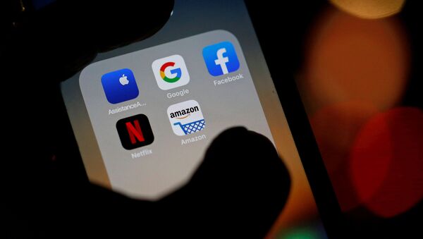 The logos of mobile apps, Google, Amazon, Facebook, Apple and Netflix, are displayed on a screen in this illustration picture taken 3 December 2019. - Sputnik International