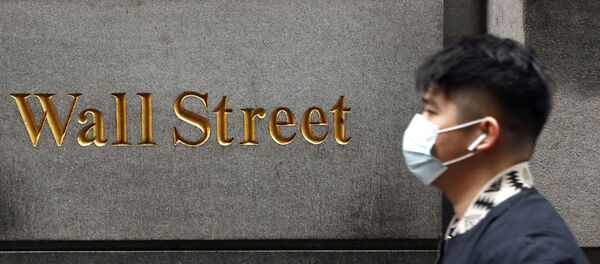 A man wears a protective mask as he walks on Wall Street during the coronavirus outbreak in New York City, New York, U.S., March 13, 2020 A man wears a protective mask as he walks on Wall Street during the coronavirus outbreak in New York City, New York, U.S., March 13, 2020 - Sputnik International