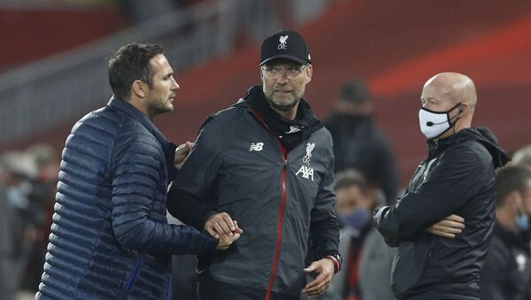Soccer Football - Premier League - Liverpool v Chelsea - Anfield, Liverpool, Britain - July 22, 2020 Liverpool manager Juergen Klopp shakes hands with Chelsea manager Frank Lampard after the match, as play resumes behind closed doors following the outbreak of the coronavirus disease (COVID-19) - Sputnik International