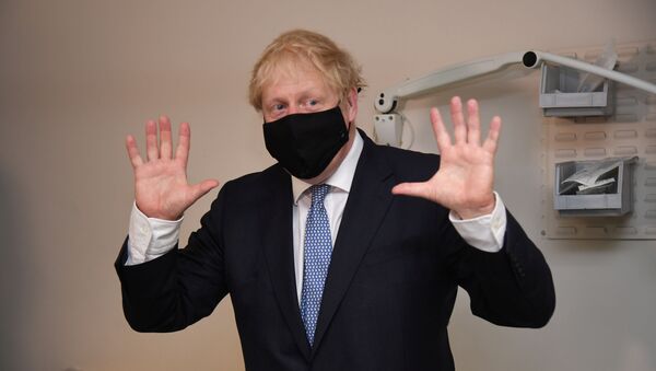 Britain's Prime Minister Boris Johnson visits the Tollgate Medical Centre in Beckton, London, Britain July 24, 2020 - Sputnik International