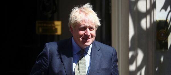Britain's Prime Minister Boris Johnson leaves Downing Street in London Britain's Prime Minister Boris Johnson leaves Downing Street in London - Sputnik International