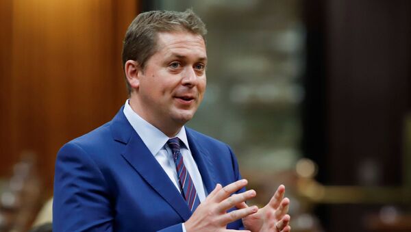 Canada's Conservative Party leader Andrew Scheer asks a question about the Economic and Fiscal Snapshot in the House of Commons on Parliament Hill in Ottawa, Ontario, Canada July 8, 2020. - Sputnik International
